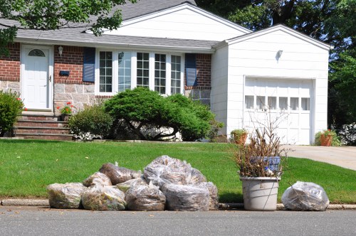 Professional garage clearance team sorting items